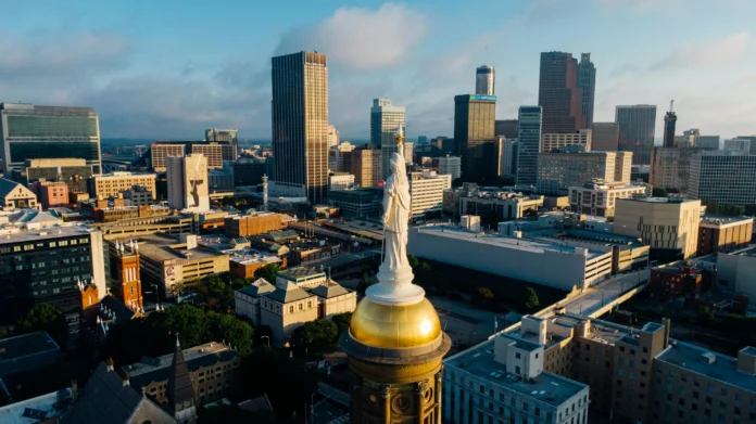 Atlanta skyline with Georgia State Capitol dome and statue in foreground — related to Georgia Business Entity Search