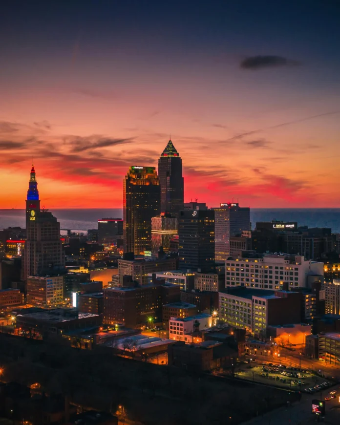 Cleveland skyline at sunset representing Ohio business activity, used for an article on Ohio Business Entity Search.